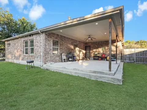 Exterior - 1557 E Springcrest Cir, Lancaster, TX 75134 photo 6 of 8