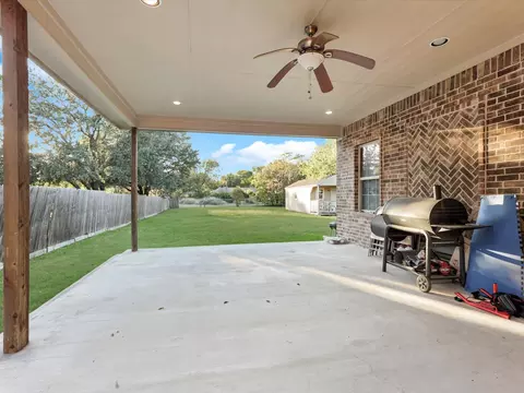 Exterior - 1557 E Springcrest Cir, Lancaster, TX 75134 photo 5 of 8