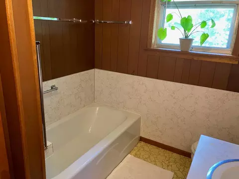 Bath - 101 W 3rd St, Roxton, TX 75477 photo 1 of 3