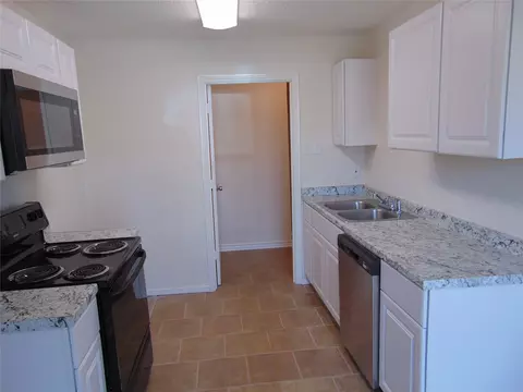 Kitchen - 210 E Hammond St, Lancaster, TX 75146 photo 2 of 5