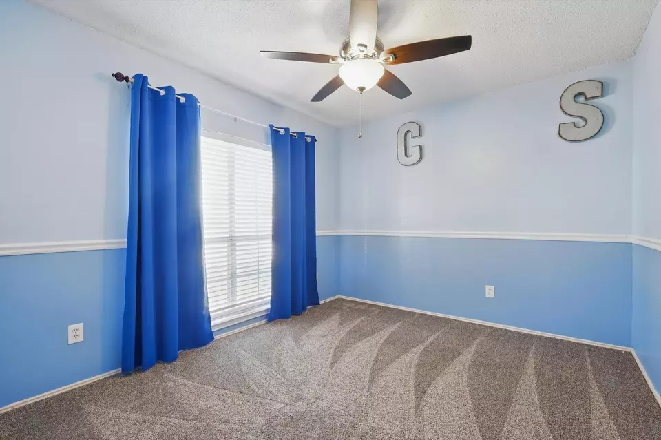 Bedroom - 5948 Madison Dr, The Colony, TX 75056 photo 6 of 7