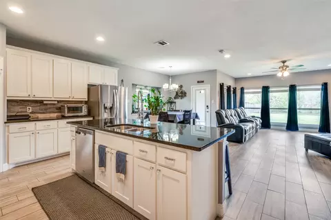 Kitchen - 348 E Pecan St, Hurst, TX 76053 photo 3 of 4