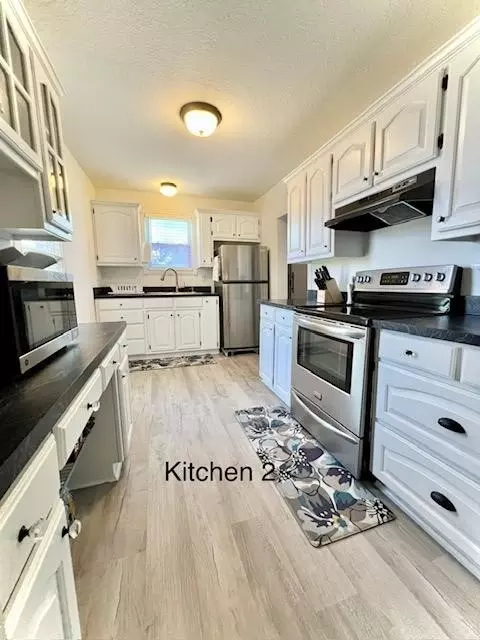 Kitchen - 213 E Boyd Ave, Boyd, TX 76023 photo 3 of 3