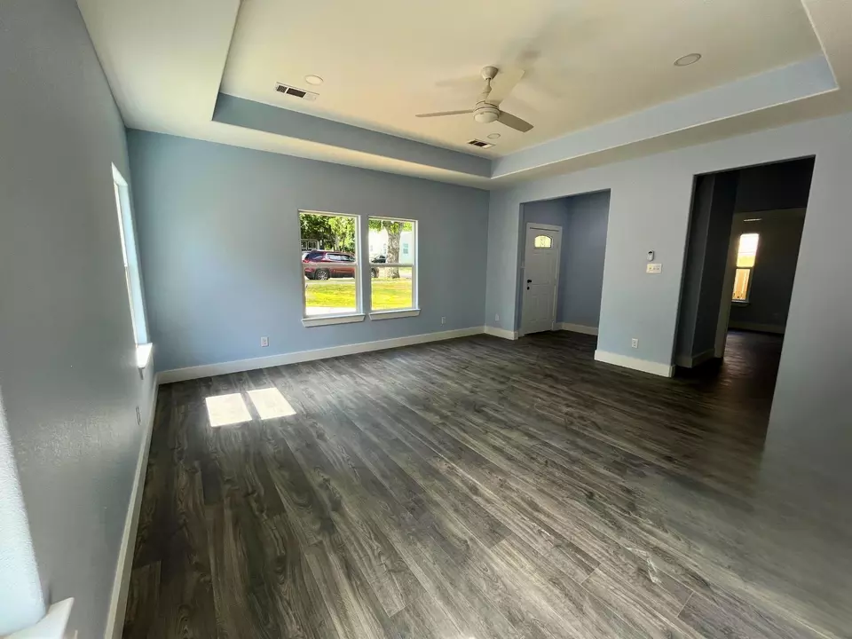 Living - 1317 E Tucker St, Fort Worth, TX 76104 photo 3 of 3