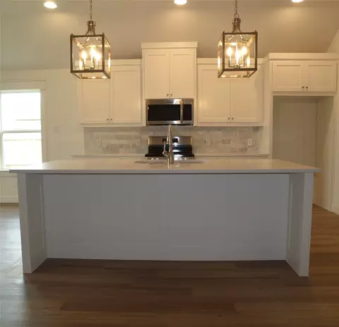 Kitchen - 705 Raylan St, Springtown, TX 76082 photo 1 of 2