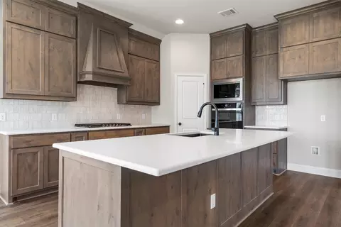 Kitchen - 416 Broken Spoke Trl, Mcgregor, TX 76657 photo 2 of 4