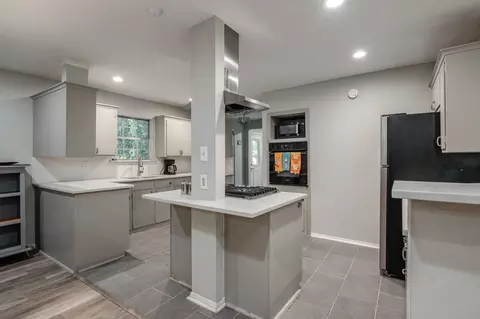 Kitchen - 1409 E Sherman Dr, Denton, TX 76209 photo 2 of 3