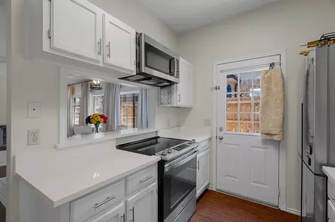 Kitchen - 709 Normandy Dr, Euless, TX 76039 photo 2 of 3
