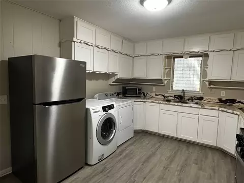 Kitchen - 400 E Liberty St, Pilot Point, TX 76258 photo 3 of 3