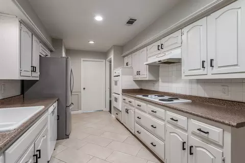 Kitchen - 1002 E Spring Valley Rd, Richardson, TX 75081 photo 2 of 3