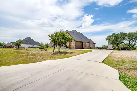 Exterior - 1053 Tex Ln, Springtown, TX 76082 photo 3 of 9