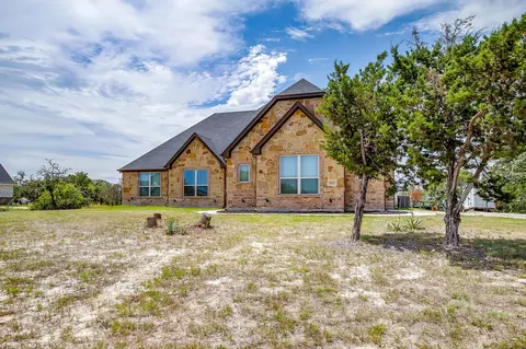 Exterior - 1053 Tex Ln, Springtown, TX 76082 photo 1 of 9
