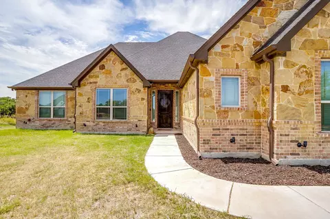 Exterior - 1053 Tex Ln, Springtown, TX 76082 photo 4 of 9