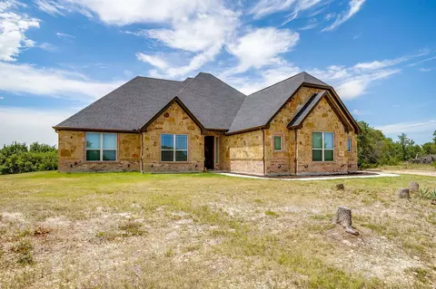 Exterior - 1053 Tex Ln, Springtown, TX 76082 photo 5 of 9