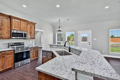 Kitchen - 897 W Cardinal St, Ector, TX 75439 photo 3 of 3