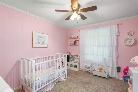 Bedroom - 1402 N Acres Cir, Springhill, LA 71075 photo 5 of 8