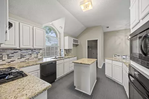 Kitchen - 7302 Belmount Rd, Rowlett, TX 75089 photo 2 of 2