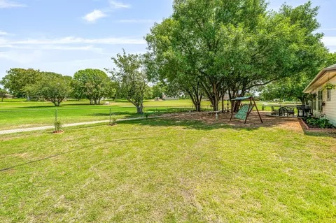 Exterior - 129 Hogan St, Comanche, TX 76442 photo 8 of 10