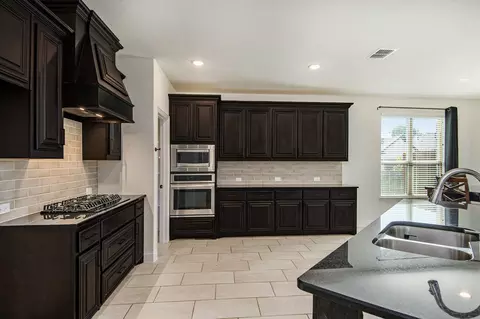 Kitchen - 8801 Conroe Dr, Argyle, TX 76226 photo 2 of 3