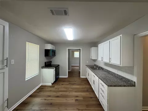 Kitchen - 306 Pullen St, Mcgregor, TX 76657 photo 1 of 2