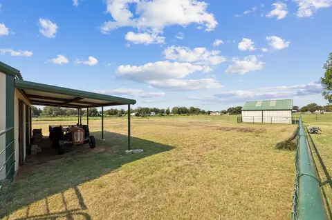 Exterior - 676 Mcvoid Rd, Springtown, TX 76082 photo 7 of 9