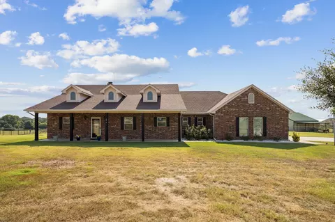 Exterior - 676 Mcvoid Rd, Springtown, TX 76082 photo 1 of 9