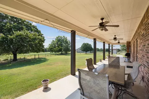 Exterior - 676 Mcvoid Rd, Springtown, TX 76082 photo 4 of 9
