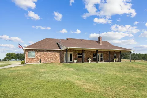 Exterior - 676 Mcvoid Rd, Springtown, TX 76082 photo 6 of 9