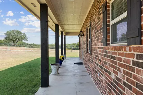 Exterior - 676 Mcvoid Rd, Springtown, TX 76082 photo 2 of 9