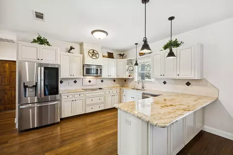 Kitchen - 676 Mcvoid Rd, Springtown, TX 76082 photo 1 of 2