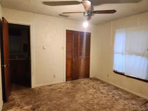 Bedroom - 209 E 2nd St, Quinlan, TX 75474 photo 3 of 4