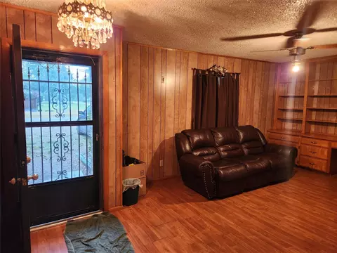 Living - 209 E 2nd St, Quinlan, TX 75474 photo 2 of 2
