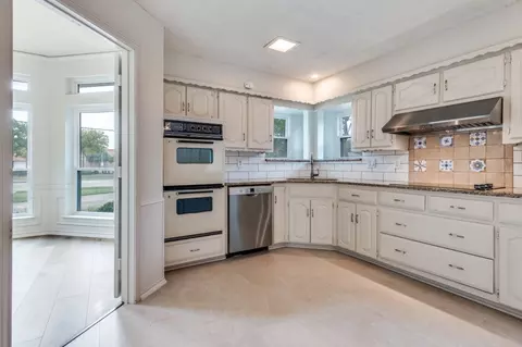 Kitchen - 1603 E Spring Valley Rd, Richardson, TX 75081 photo 3 of 4