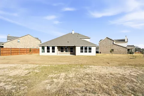 Exterior - 1100 Trinity Dr, Springtown, TX 76082 photo 7 of 8