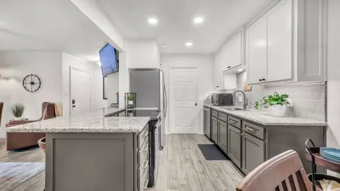 Kitchen - 3059 Hells Gate Loop #7, Strawn, TX 76475 photo 6 of 7