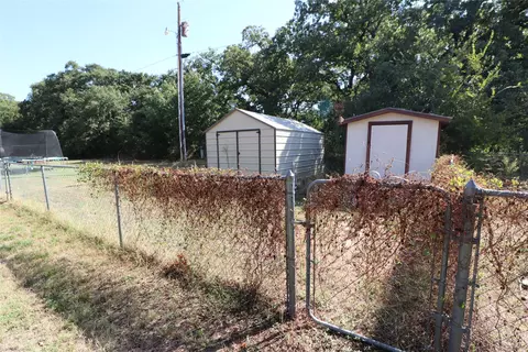 Exterior - 212 Palmer Dr, Comanche, TX 76442 photo 4 of 18