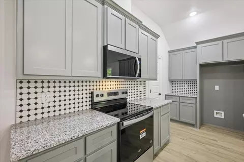 Kitchen - 111 N Oak St, Ector, TX 75439 photo 3 of 3