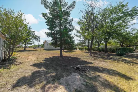 Exterior - 401 E Goodwin St, Bangs, TX 76823 photo 7 of 16