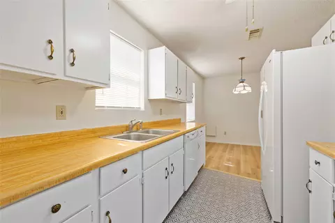 Kitchen - 401 E Goodwin St, Bangs, TX 76823 photo 3 of 4