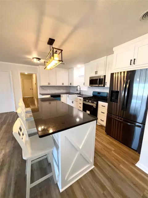 Kitchen - 903 E Hall St, Bangs, TX 76823 photo 1 of 3