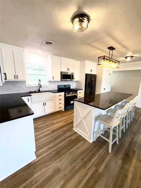 Kitchen - 903 E Hall St, Bangs, TX 76823 photo 3 of 3
