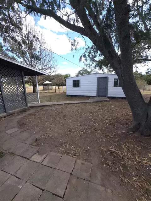Exterior - 903 E Hall St, Bangs, TX 76823 photo 5 of 8
