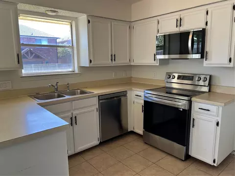 Kitchen - 402 Emerson Dr, Euless, TX 76039 photo 2 of 2