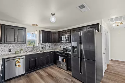 Kitchen - 610 Mcvoid Rd, Springtown, TX 76082 photo 3 of 3