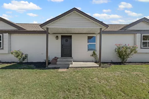Exterior - 610 Mcvoid Rd, Springtown, TX 76082 photo 4 of 8