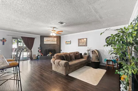 Living - 301 E Hampton Rd, Crowley, TX 76036 photo 1 of 3
