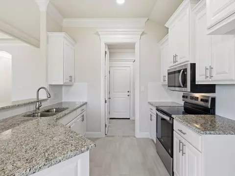 Kitchen - 724 Raylan St, Springtown, TX 76082 photo 2 of 4