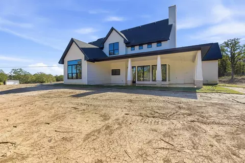 Exterior - 1552 Lakeridge Blvd, Sunset, TX 76270 photo 7 of 9