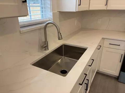 Kitchen - 719 E Commerce Ave, Cooper, TX 75432 photo 3 of 4