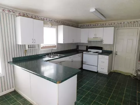 Kitchen - 505 South St, Springhill, LA 71075 photo 1 of 2